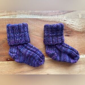 Last chance! 
Hand knit Baby Socks—that will actually stay on your baby’s feet!